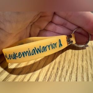 Add a support bracelet or keychain to your order! Leukemia fundraiser wristband